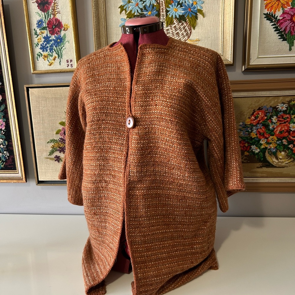Woman’s gorgeous hand woven sweater.